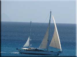 Sailboat passing by Saba